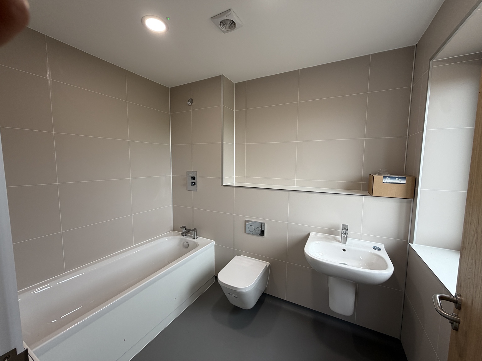 Bathroom with bath, basin and toilet