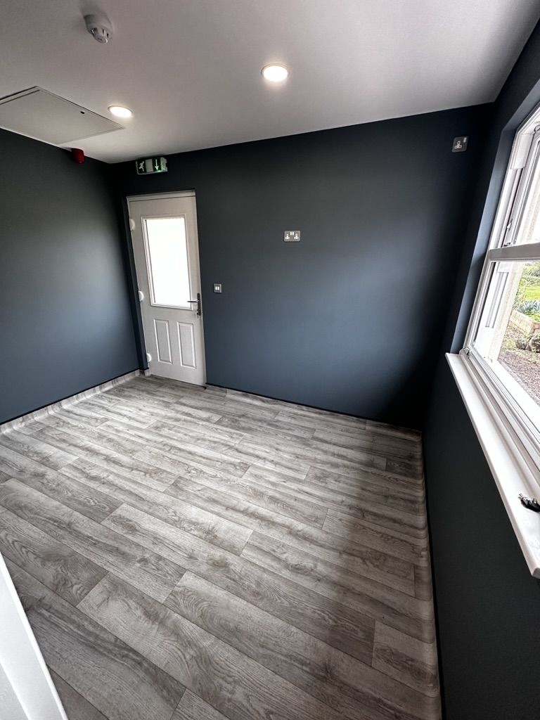 Refurbished interior with wood-effect flooring